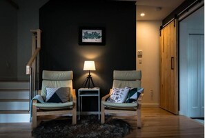 Intimate moments and shared stories unfold in this cozy corner, where elegance meets comfort for two.