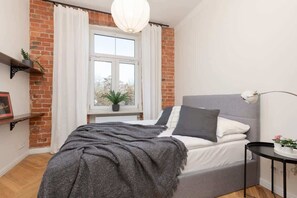 Bedroom with a comfortable double bed.