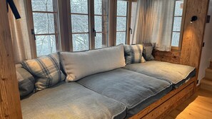Cozy Window Seat with a Snowy View