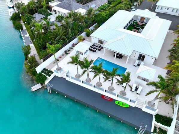 The villa is surrounded by greenery for added privacy