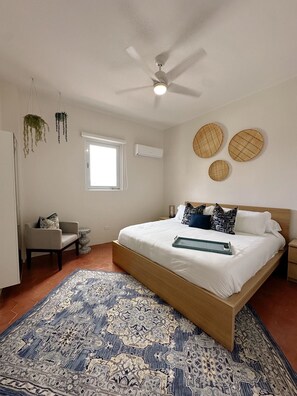 Bedroom #1 with views the Condado Lagoon & ocean.