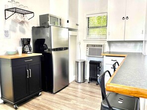 Wall air conditioner centrally located in unit and convenient when working from home at the counter space. Heaters in bedroom and bathroom with an extra portable heater available. 