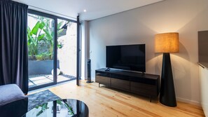 This wonderful space counts with a comfortable big counch and a flat screen TV for your entertainment #comfort #contemporary