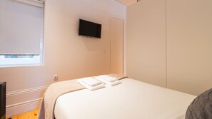 TV in the bedroom for maximum comfort and practicality #relax #airbnb