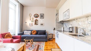 Fully equipped kitchenette with a microwave, stove, oven, electric kettle, coffee machine, toaster and more. #cooking #lovelystay