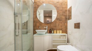Elevate your stay with a touch of luxury in our stylish and spa-like bathroom. #LuxuryBath #PamperYourself