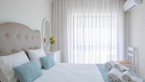 Experience the epitome of comfort in our double bedrooms, featuring a luxurious bed and your own personal AC unit. #comfort #AC