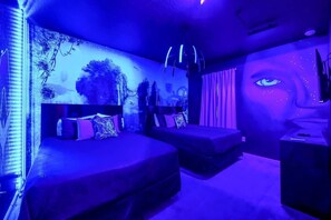 Upstairs Avatar themed room with two full size beds.