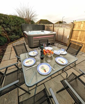 Evening suntrap by the hot tub
