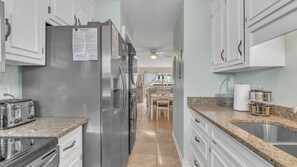 Indoors, Kitchen, Ceiling Fan, Refrigerator, Sink