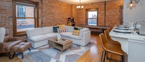 Unwind after a day in the city with our 65in Smart TV and fun games like Pacman!