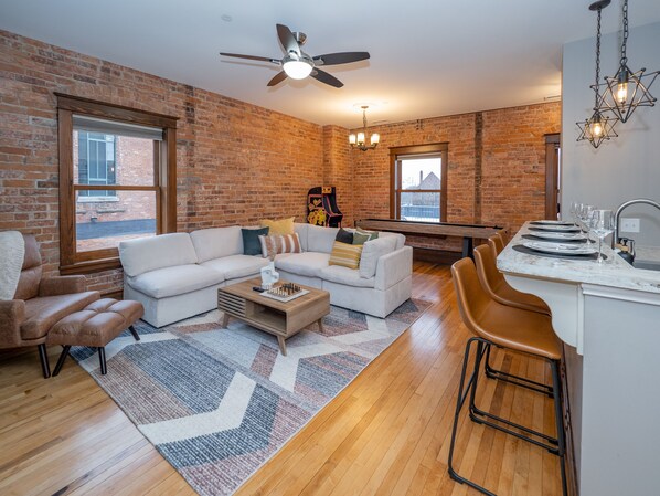 Unwind after a day in the city with our 65in Smart TV and fun games like Pacman!