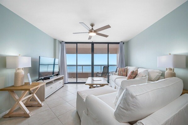 Pristine coastal living area with exquisite beach views