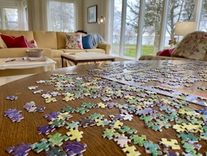 Pick out a game or puzzle to enjoy at the living room table.
