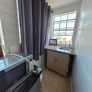 Sink and pantry.