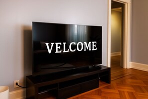 Smart TV with welcome message and streaming access