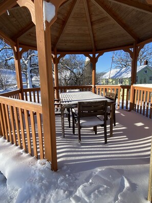 Outdoor dining under the gazebo