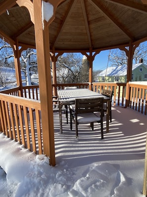 Outdoor dining under the gazebo