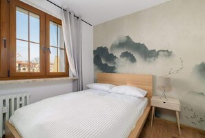 Bedroom with a very comfortable double bed and closet