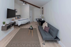 Open-concept living room with smart TV