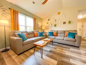 2 comfy couches, perfect for relaxing after a day on the sand.