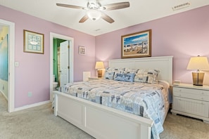 King bedroom with ensuite full bath; hallway to the left