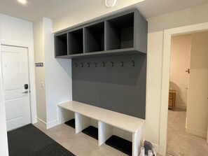 Entry with large bench and lots of cubbies for all of your gear