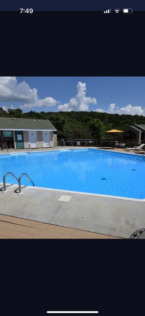 Out door pool and hot tub! 3min walk from condo