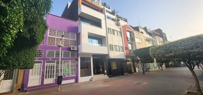 Plateau Neighborhood in City of Praia. apt on Rua Pedonal's tree covered street