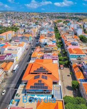 Plateau Neighborhood in City of Praia. apt on Rua Pedonal's tree covered street