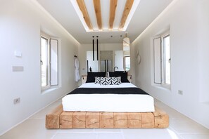 Master bedroom upstairs with balcony