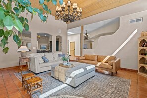 Beautiful main living room with wood-burning, showcase, fireplace!