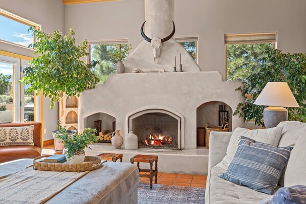 Beautiful main living room with wood-burning, showcase, fireplace!