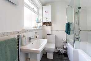 Take a break from it all—our bathtub is perfect for a blissful escape!