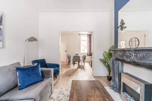 Spacious and inviting living room, ideal for unwinding or enjoying time with family and friends.
