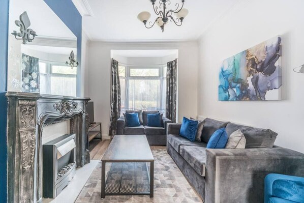 Bright and welcoming living room, perfect for relaxing or gathering with loved ones.