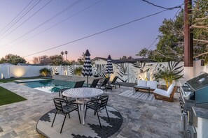 Outdoor entertainment and cooking with a built-in bbq.