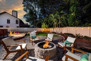 Gather round the cozy fire pit and cherish memorable moments with your loved ones!