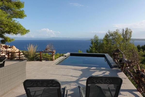 Pool & terrace with sea & island view