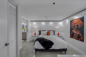 2nd interior bedroom, queen bed, Roku tv, private attached bathroom