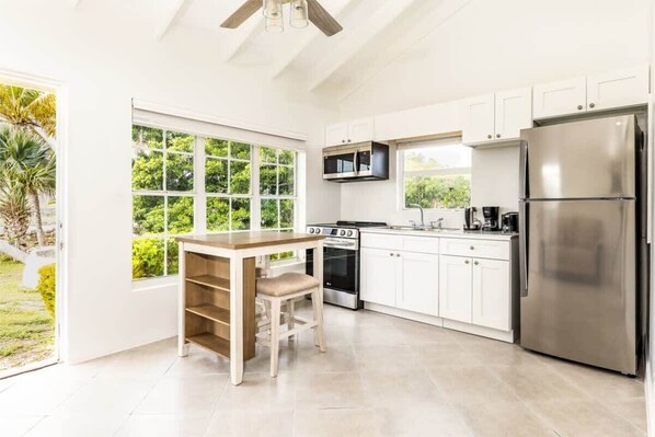 The kitchen has quality appliances and all the basics needed