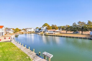 This lovely home sits Canal Front in Captain's Cove Golf and Yacht Club!