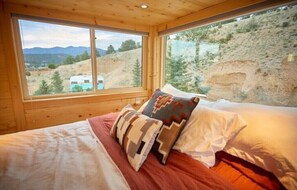 Master bed is a Queen with a great view of the mountain. 