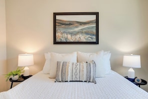 Bright queen bedroom, located upstairs, filled with lots of natural light. Plush memory foam mattress, luxurious linens and soft pillows are provided for ultimate comfort.
