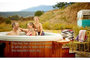 Hot tub has a great view of the mountain.