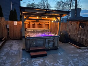 Enjoy relaxing in the hot tub for stress relief and improve sleep