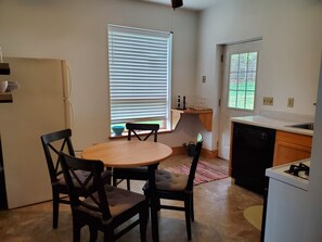 Kitchen table with seating for 4 people.