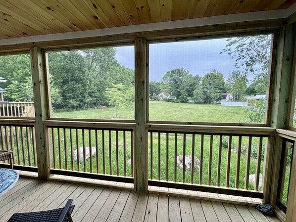 Screened in Porch viewing the field