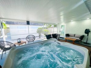 Relax and enjoy the 4 person hot tub in the private lanai.
