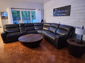 Family room opens to patio; perfect layout for chatting with kitchen cooks.